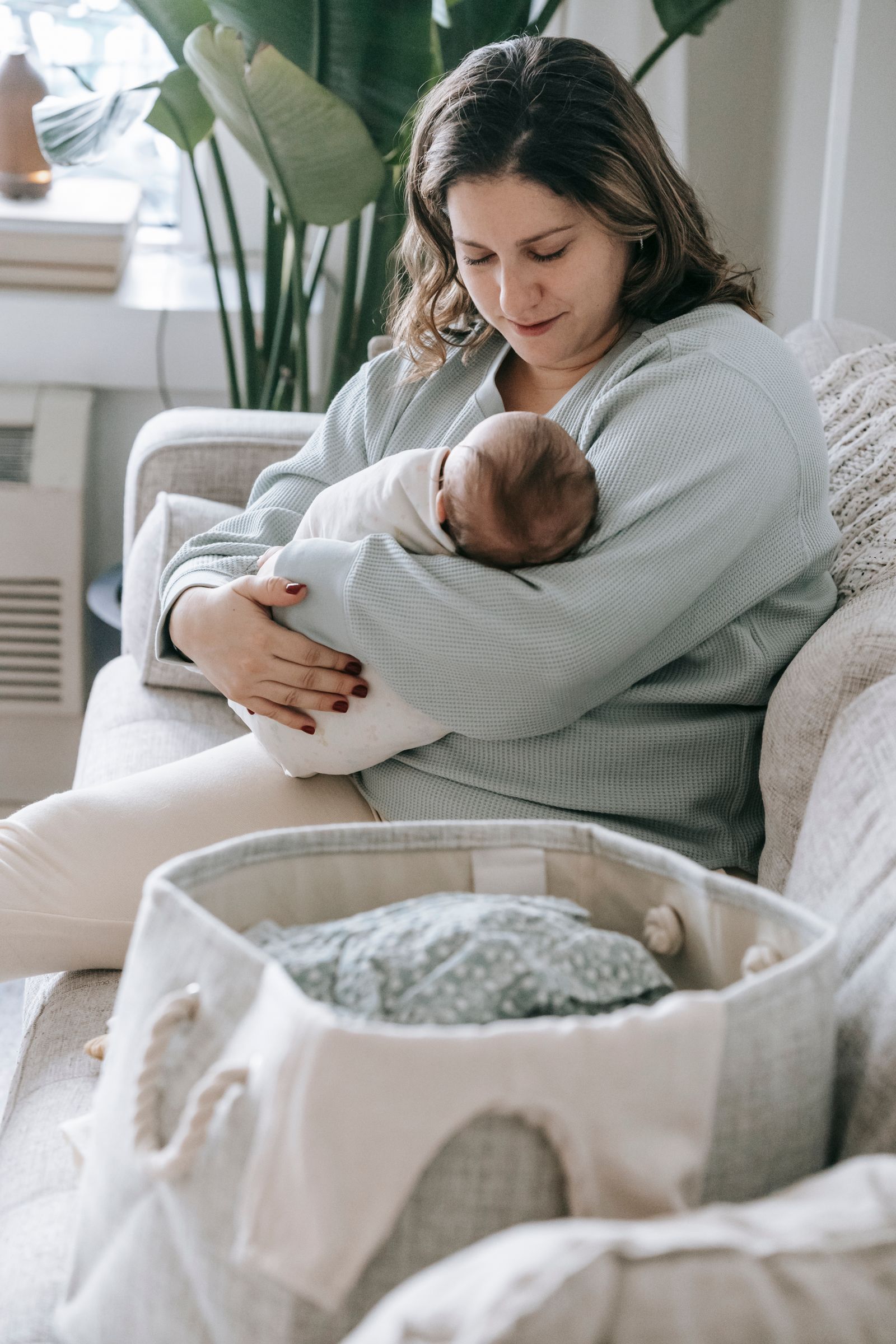 Mother cradling her newborn at a Salt Lake area birth center